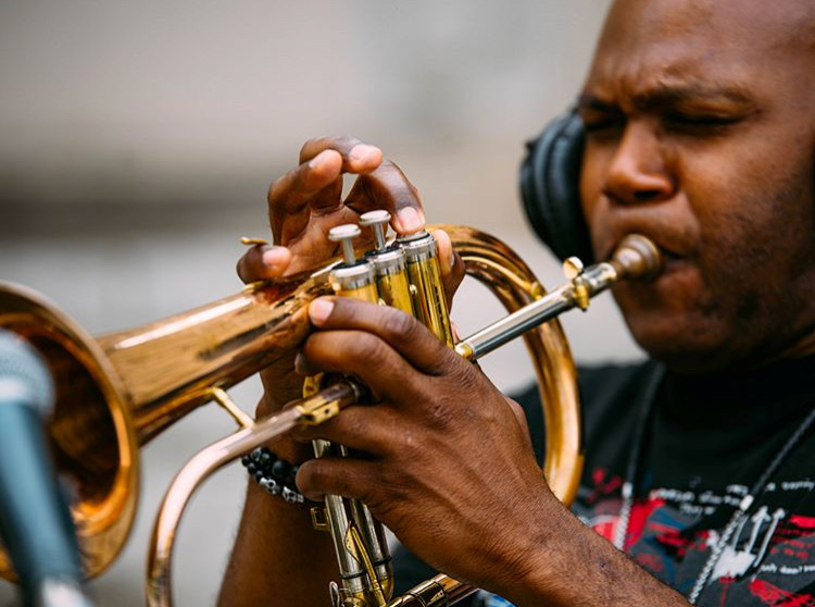 man playing trumpet